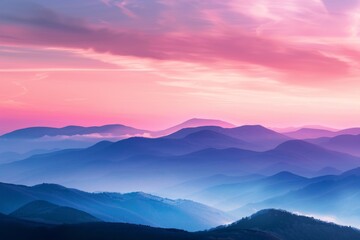 A breathtaking view of a mountain range at sunrise, with vibrant colors and mist in the valleys. The composition includes space for inspirational text.