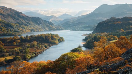View of autumn landscape of llanberis and llyn padarn in wales with vibrant foliage and serene lake surrounded by majestic mountains