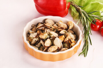 Marinated mussels in the bowl