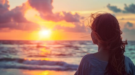 serene sunrise: woman admiring the seascape beauty