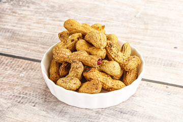 Raw ripe unpeeled peanut heap