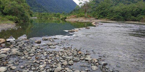 rocks in a river in rural Indonesia