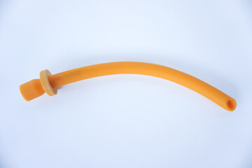 nasopharyngeal airway tube isolated on white. NPA maintains airway patency in spontaneously breathing patients with intact gag reflexes.