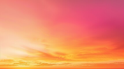 Obraz premium A beautiful gradient background transitioning from deep orange to soft pink.