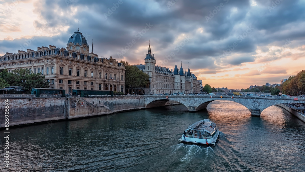 Poster Conciergerie and Seine River in Paris at sunset