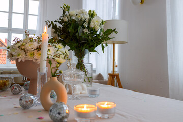 Vase with white flowers, mirror ball, selective focus
