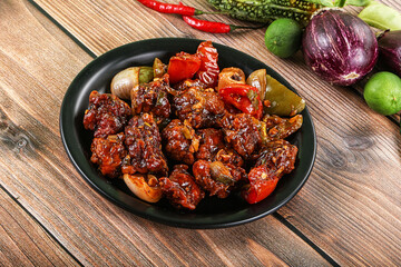 Asian cuisine - pork with chili sauce