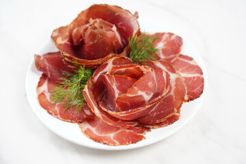 Italian dried ham. Coppa Stagionata. Jerked meat