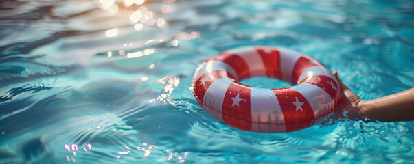 Naklejka premium A person holding a red and white lifebuoy in a swimming pool, capturing the essence of summer, safety, and relaxation under the sun.