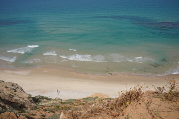 Mediterranean sea in spring.  Deserted shorekurkar sandstone cliff nature reserve, high above the...