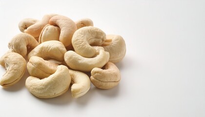 roasted sea salt cashew nuts - Anacardium occidentale - whole and halves. isolated on white background with copy space. natural product of South America