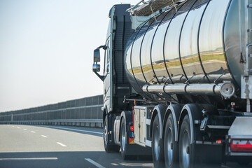 Long vehicle tank trailer on a highway. Oil petrol tanker