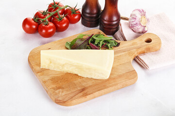 Piece Italian hard parmesan cheese