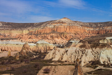 Beautiful fabulous landscape, bizarre mountains. Sandstone formations. Unusual mountains, stone volcanic formations. Strange and amazing views. Cappadocia, Turkey.