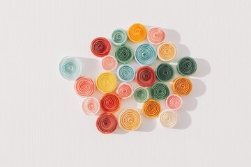 Paper quilling,colorful paper circles. paper abstract background. Colored strips of paper. Hand made of paper quilling technique. top view