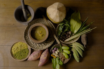 Indonesian food is placed along with its ingredients and spices