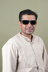 Portrait of a happy farmer man looking at the camera