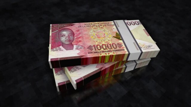 Guinea money Guinean francs pile pack. Concept background of economy, banking, business, crisis, recession, debt and finance. GNF 10000 banknotes stacks 3d animation.