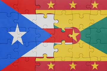 puzzle with the colourful national flag of grenada and flag of puerto rico .