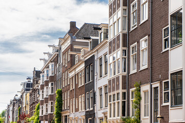 Naklejka premium Traditional old buildings in Amsterdam, the Netherlands