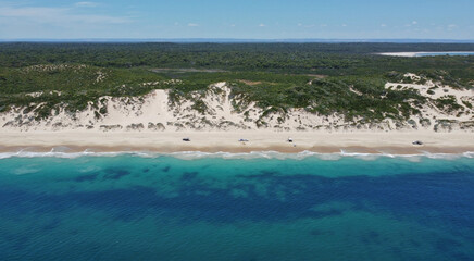 Drone, Christmas day, 4x4 driving (4WD) on Preston Beach, just south of Perth, Western Australia. Camp, swim and eat. Turquoise colored water, white sand dunes 