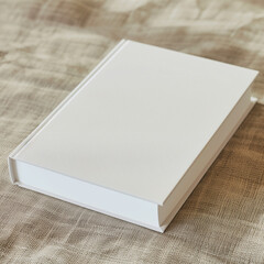 Fototapeta premium **pro t of view POV view imaginestock photo of a book mockup with absolutely white blank label, laying down on a flat surface, mockup template for a small book. Photoreal, photography, product. Empty 