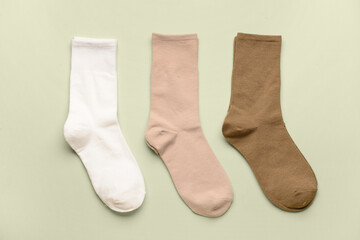 Basic color socks on green background