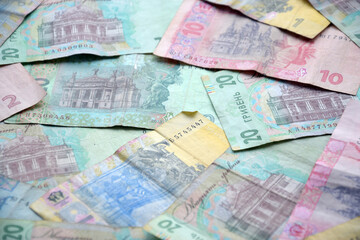 Processed collage of Ukrainian Hryvnia UAH bills banknotes texture. Background for banner
