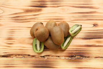 Fresh kiwi on wooden background