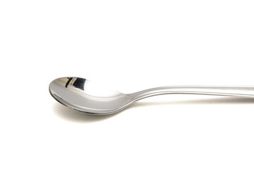 Metal large spoon in white background