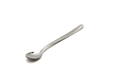 Metal large spoon in white background