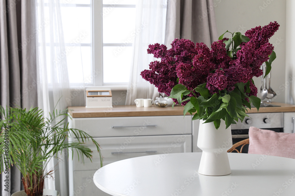 Canvas Prints Vase with beautiful blooming lilac flowers in kitchen