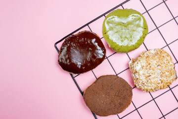 Various delicious donuts with different sprinkled decorations