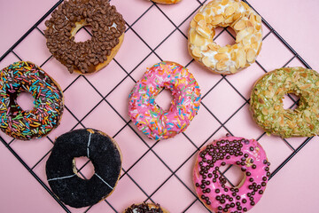 Various delicious donuts with different sprinkled decorations