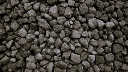Black or dark gray rough grainy stone texture background, copy space