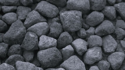 Black or dark gray rough grainy stone texture background, copy space