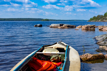 Kayak on the shore of the lake. Quiet and serene scene of vacation spot for travel