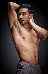 Fototapeta premium Fitness, asian man and body builder flexing abs and strong torso for exercise goal isolated in studio. Health, thinking and male person with stomach muscles from calisthenic training and workout