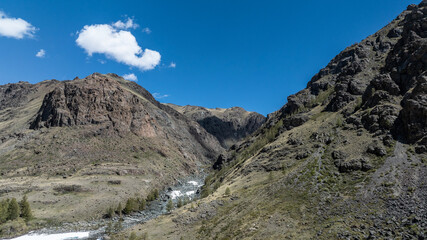 landscape of the surroundings of the village of Kosh Agach mountains with lakes and unusual landscapes in the southern regions of Altai in May
