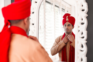 Indian, groom and mirror for wedding, culture and turban for attire of man, clothes and...