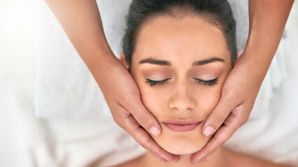 Face, hands for massage and woman in beauty spa with masseuse to relax for health, peace or...