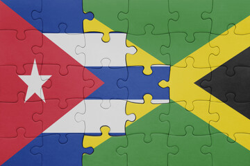 puzzle with the colourful national flag of jamaica and flag of cuba .
