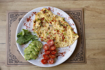 omelet with spinach and tomatoes