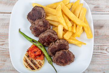 Turkish Cuisine Grilled Meatballs. Turkish meatball traditional kofte. Spicy meatballs Kebab or Kebap. Grilled meat balls.