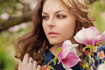 Fototapeta premium Beautiful girl's face with flowers