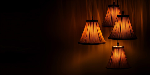 A black background with light and shadow effects from lamps, giving a warm and mysterious feel.