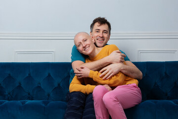 Wife's cancer recedes, couple celebrates hugging and kissing