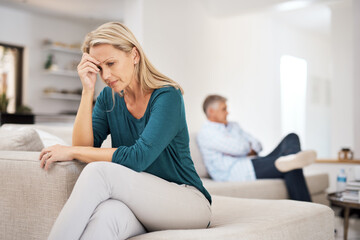 Couch, couple and fight in home for annoyed, divorce or married people for argument. Disagreement, sofa and lounge for frustrated woman, affair or emotion in toxic relationship with mature partner