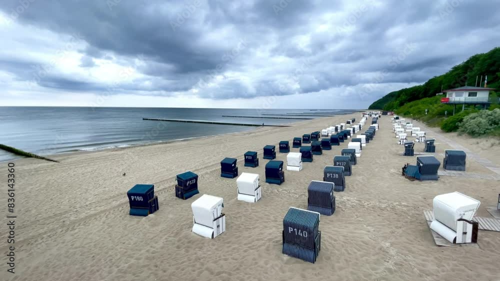 Sticker beach with beach chairs on stormy weather