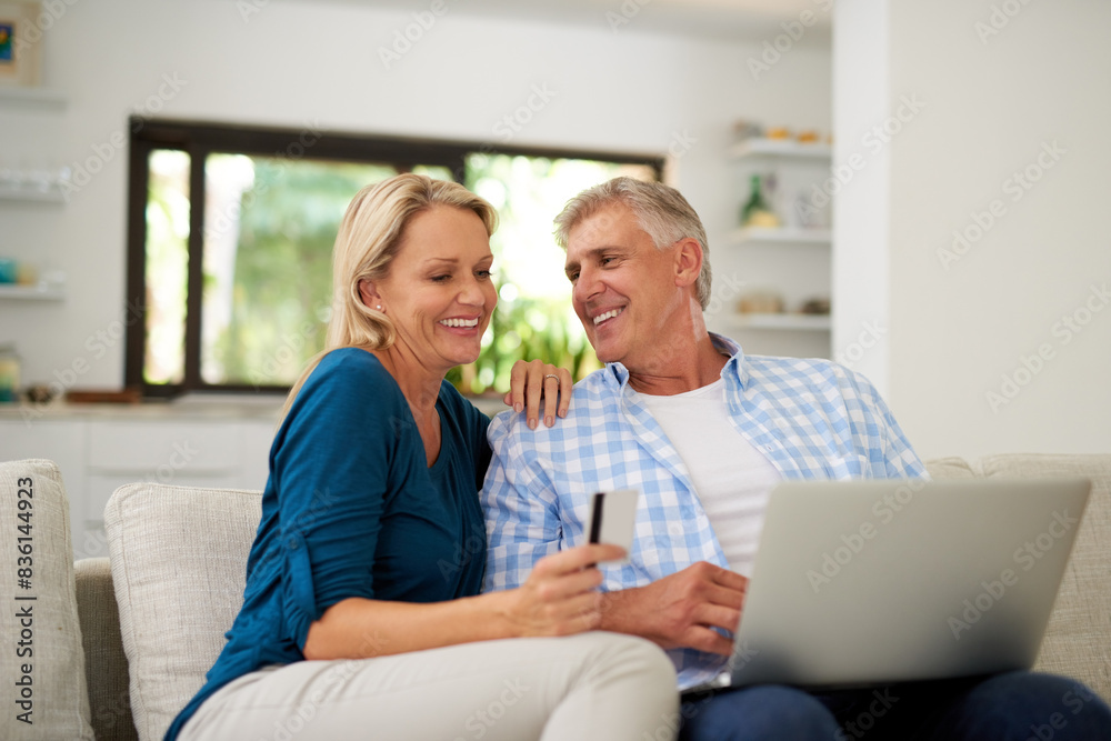 Sticker Mature, couple and laptop with credit card on couch for online shopping, payment and saving plan. People, home and happy on sofa in living room for internet banking, budget and investment or finance